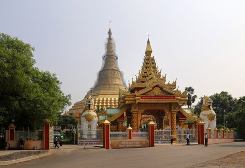 Global Vipassana Pagoda in the middle of a street.